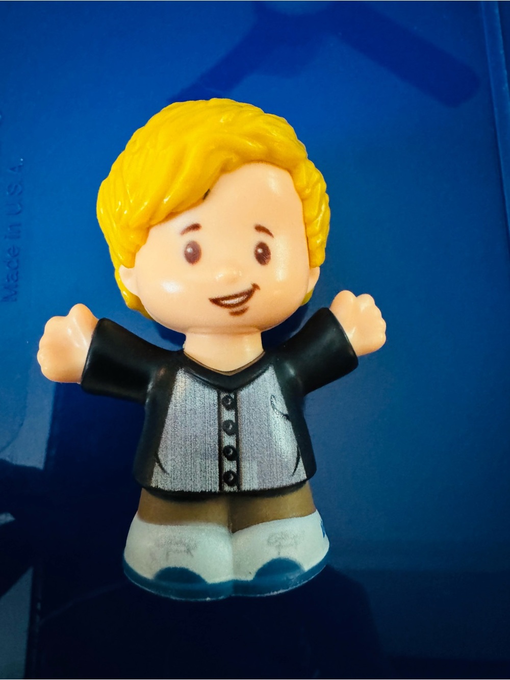 Blonde-Haired Kids Figure Toy in Black & Gray Outfit